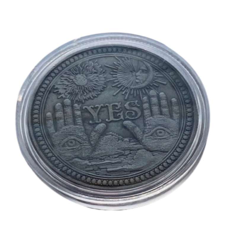 The Yes side of the Yes/No metal coin. It is inside a round clear plastic case.
Each Destiny Decision Candle comes with a keepsake metal Yes/No flipping coin and plastic case.